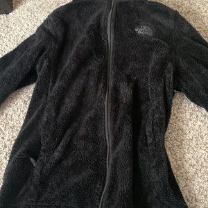 black fuzzy northface jacket
